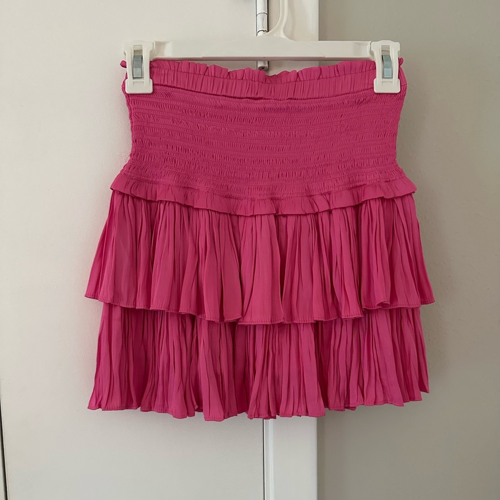**NEVER WORN** Super cute pink mini skirt.